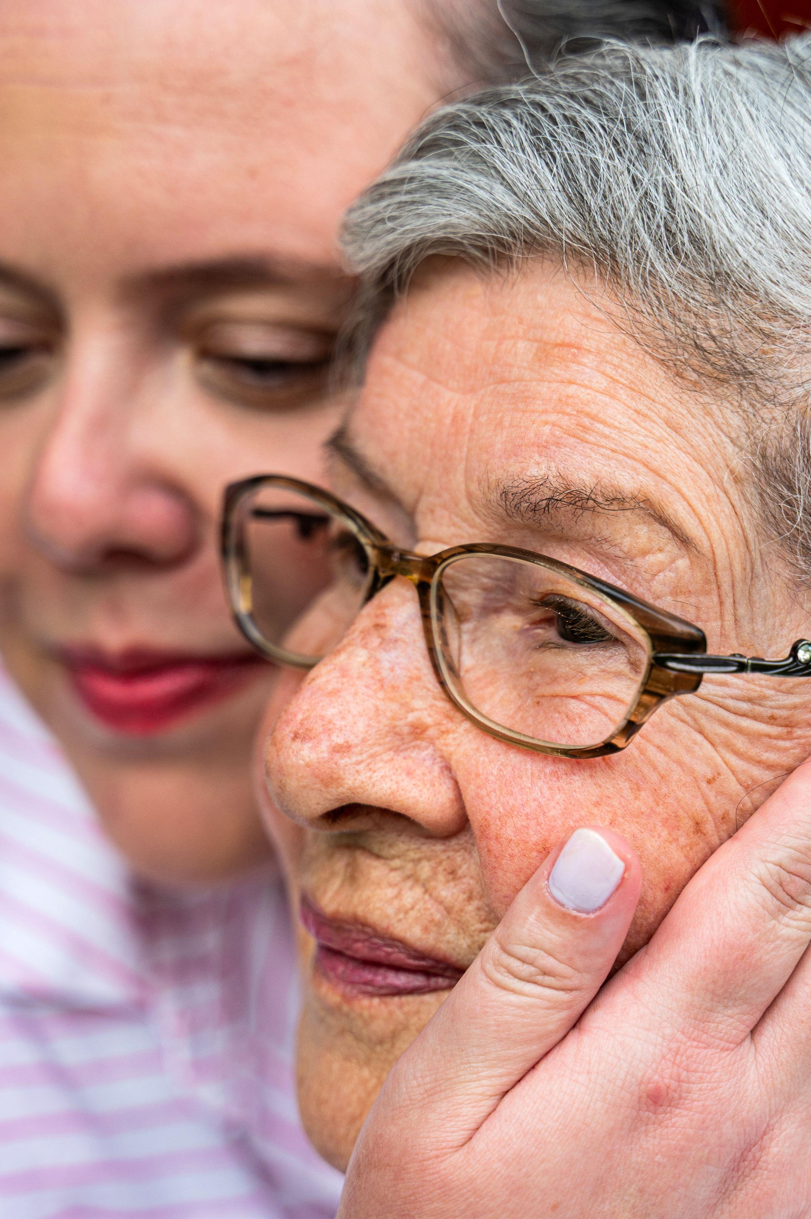 Family discussing dementia care placement options with support