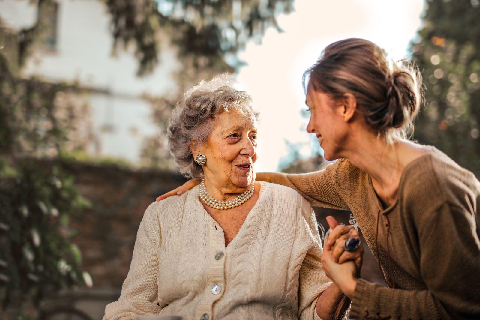 An older person settled and cared for, with family