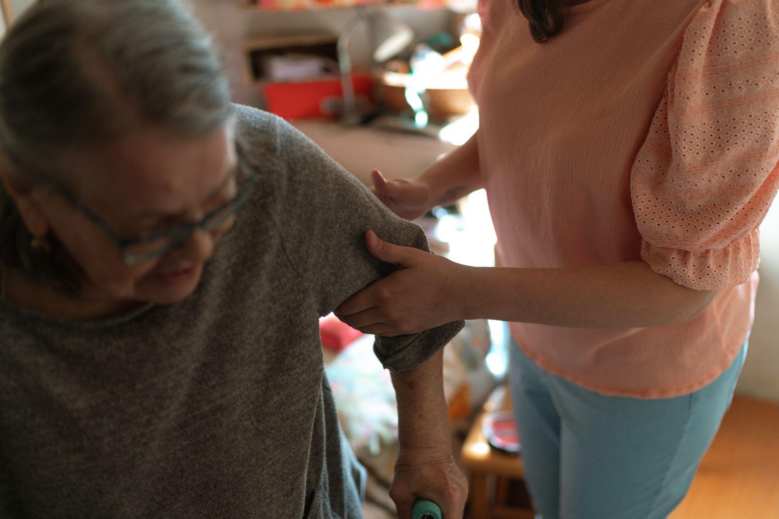 A nurse assessing a resident's care needs